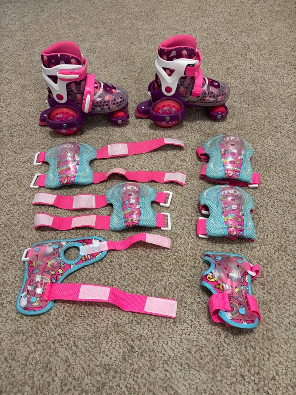 Pink & Purple Kids Adjustable Roller Skates with Pink & Teal Protective Pads